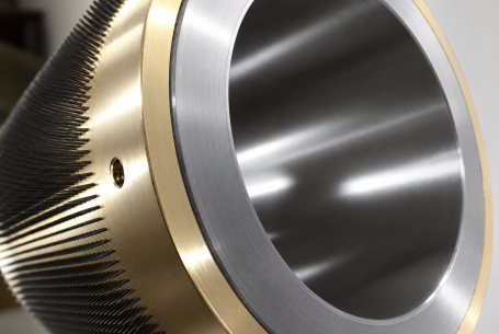 Large diameter roller with sleeve inserted to fit roller shaft
